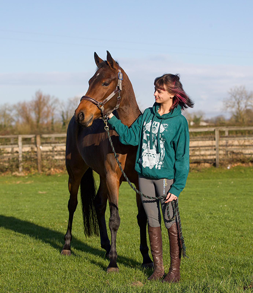 Molly Piper from the social media Mollyandthegreys with Dark brown horse Mocha